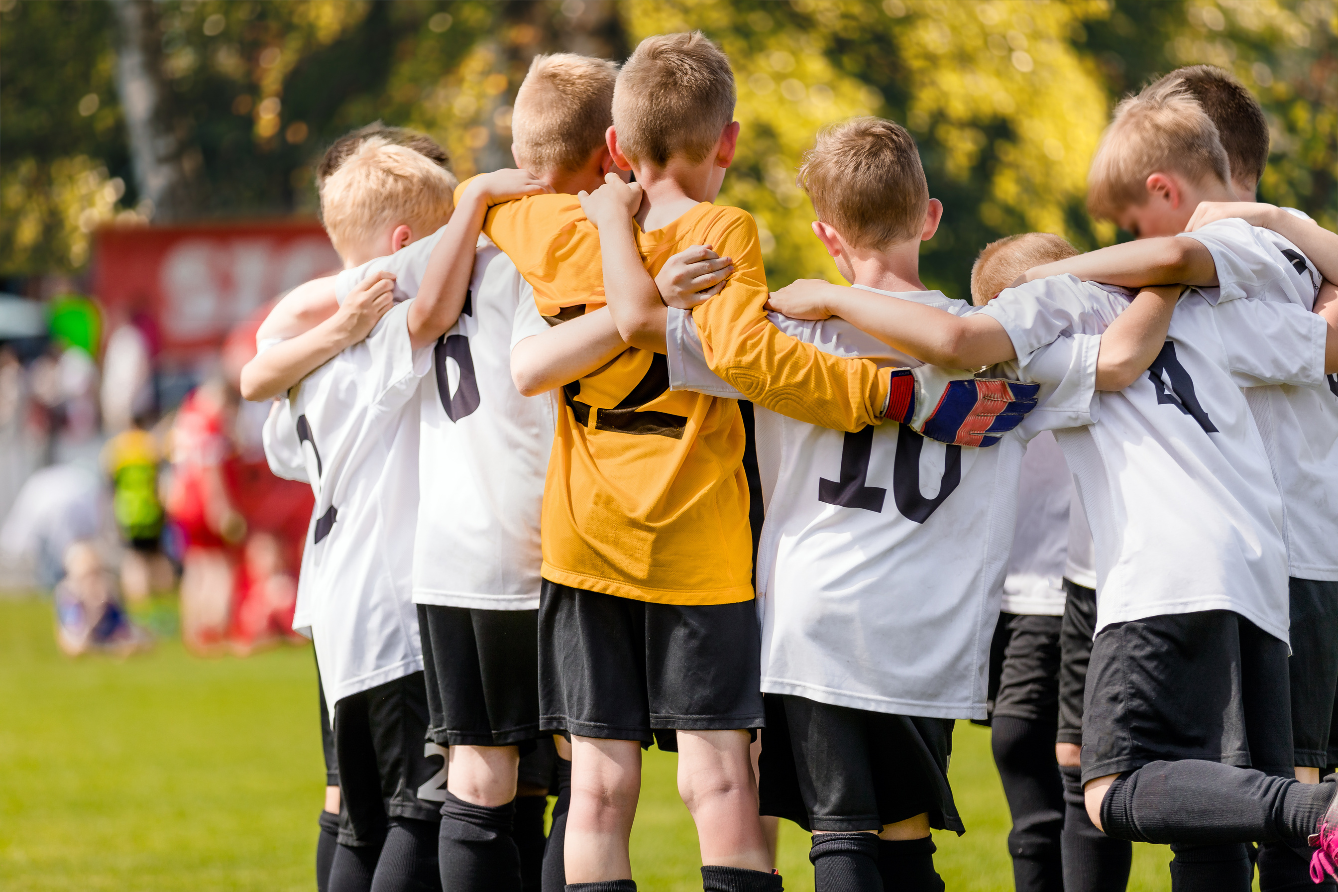 Group of  Sports Boys Huddling in a Team
